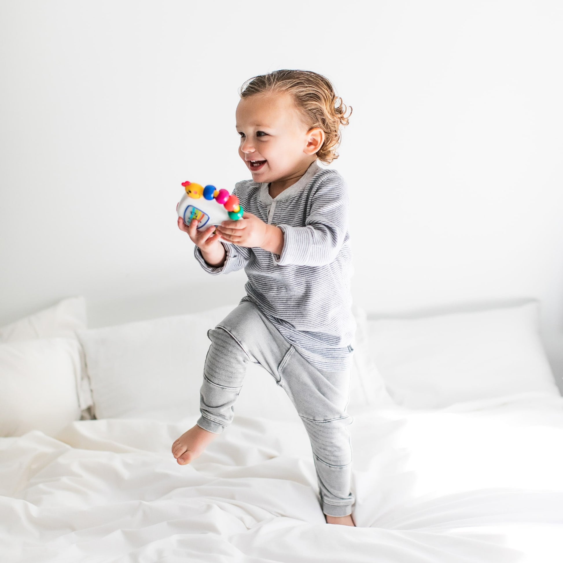 VERI CUTE Take along Tunes Musical Infant Toy with Volume Control